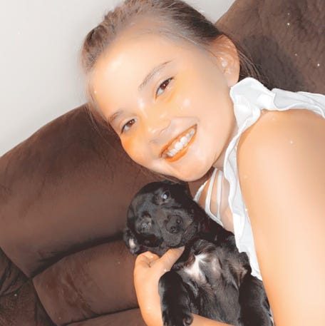 Katelynn Elizabeth Simonds and her dog, 'Little Man'