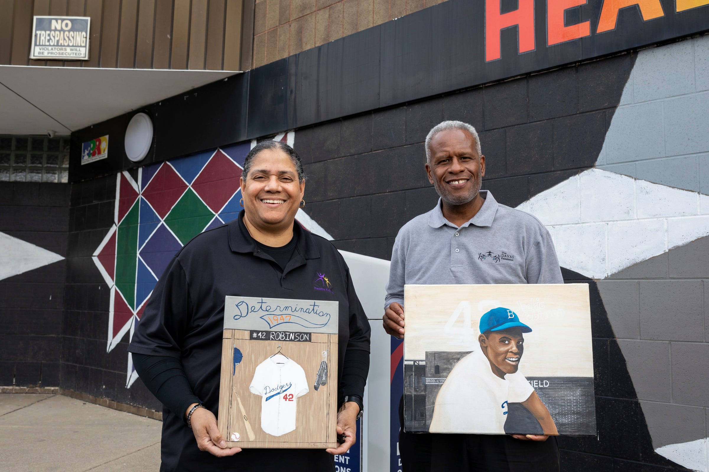 Maria Adams-Lawton, CEO of Healthy Kidz Inc. at Tindal Activity Center, stands next to her longtime friend Sam Abrams, founder of The Davas Foundation, outside the Tindal Activity Center in Detroit on Wednesday, April 10, 2024.