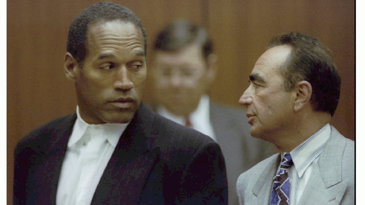 O.J. Simpson looks toward attorney Robert Shapiro at his arraignment on June 20, 1994.