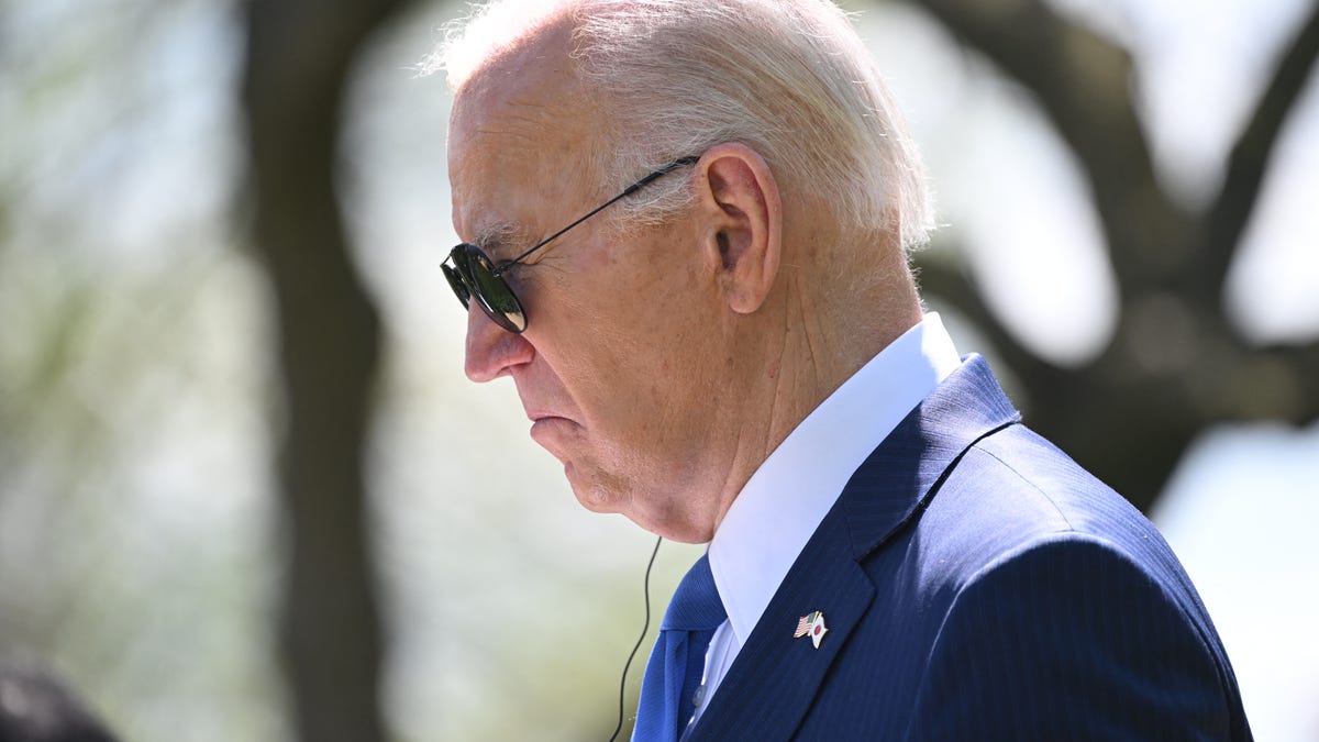 US President Joe Biden listens during a joint press conference with Japanese Prime Minister Fumio Kishida (out of frame) in the Rose Garden of the White House in Washington, DC, April 10, 2024. (Photo by SAUL LOEB / AFP) (Photo by SAUL LOEB/AFP via Getty Images)