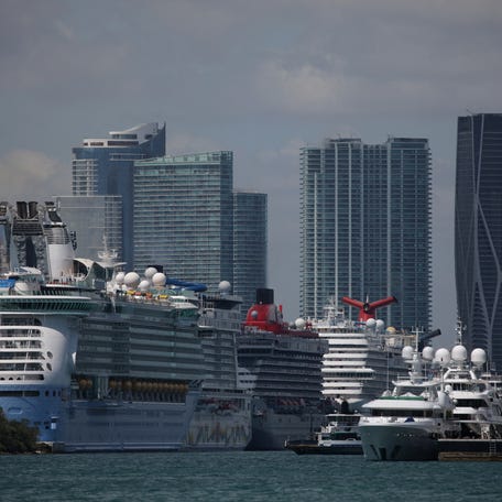 Cruises ships are seen docked in Miami, Florida, U.S., March 18, 2020.