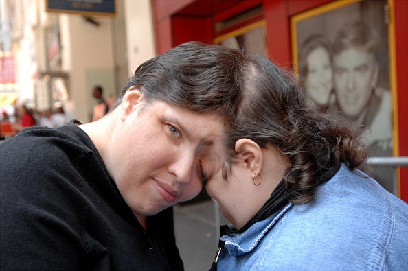 Lori and George Schappell, the world's oldest female conjoined twins, attend the opening celebration of the new Ripley's Believe It or Not Odditorium in Times Square.
