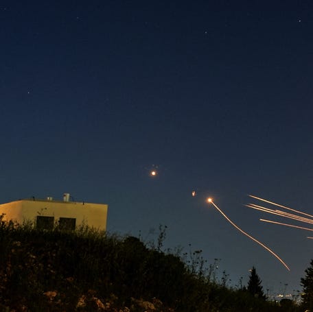 Israel's Iron Dome anti-missile system intercepts rockets launched from Lebanon towards Israel over the Israeli Lebanese border, on April 12, 2024.