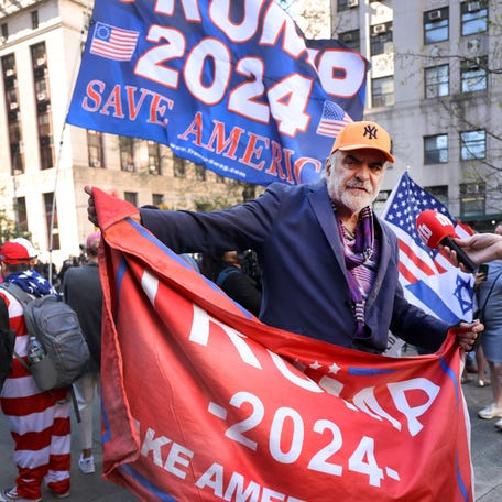 Trump supporter Gary Phaneuf rallies outside of the New York State Supreme Court during the arrival of former President Donald Trump on April 15, 2024 in New York City.