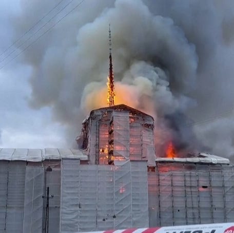 Spire collapses in Copenhagen Fire as the historic stock exchange is engulfed by flames