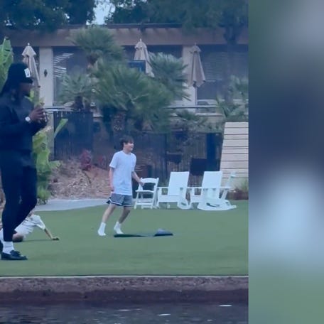 Cam Newton, former Carolina Panthers quarterback, joined kids in a game of catch at the JW Marriott in Phoenix, AZ while waiting for his table.