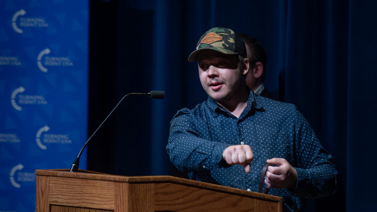 Kyle Rittenhouse speaks to the nearly sold out auditorium at Kent State University's student center on Tuesday, April 16.