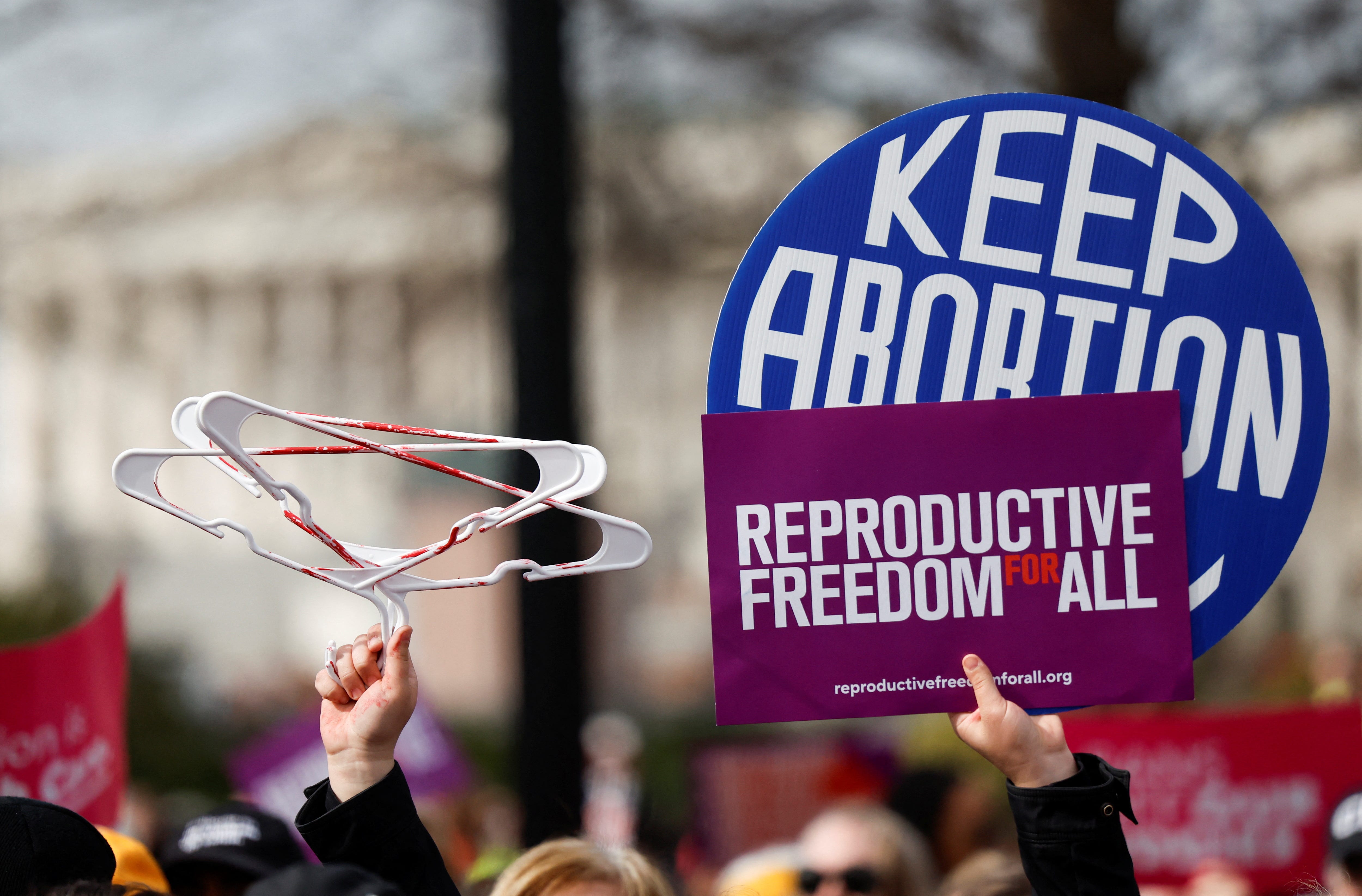 Demonstrators for abortion rights take part in a protest outside the U.S. Supreme Court as justices hear oral arguments in a bid by President Joe Biden's administration to preserve broad access to the abortion pill, in Washington, U.S., March 26, 2024. REUTERS/Evelyn Hockstein