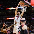 Heat roll Bulls to secure final playoff spot in East, set up showdown with Celtics