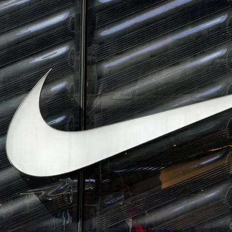 The Nike swoosh logo is seen outside the store on 5th Ave in New York, New York, U.S., March 19, 2019.