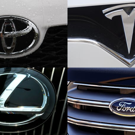 Toyota, Tesla, Lexus and Ford car logos.