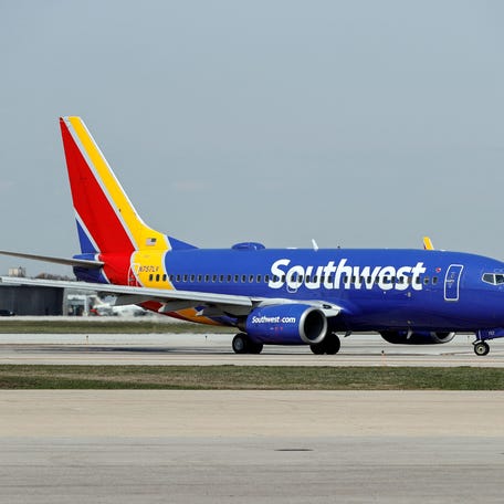 A Southwest Airlines Boeing 737-7H4 jet taxis to the gate after landing at Midway International Airport in Chicago, Illinois, on April 6, 2021. (Photo by KAMIL KRZACZYNSKI / AFP) (Photo by KAMIL KRZACZYNSKI/AFP via Getty Images)