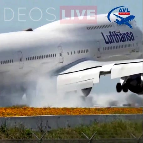 Video footage of a Boeing 747's landing, operated by Lufthansa Airlines, shows the aircraft skidding on the runaway and then bouncing off the ground as it attempts to land at LAX Airport in Los Angeles.