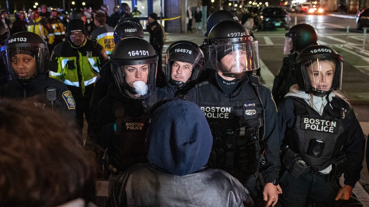 Police and pro-Palestinian supporters face off after the Emerson College Palestinian protest camp was cleared by police in Boston, Massachusetts, on April 25, 2024.