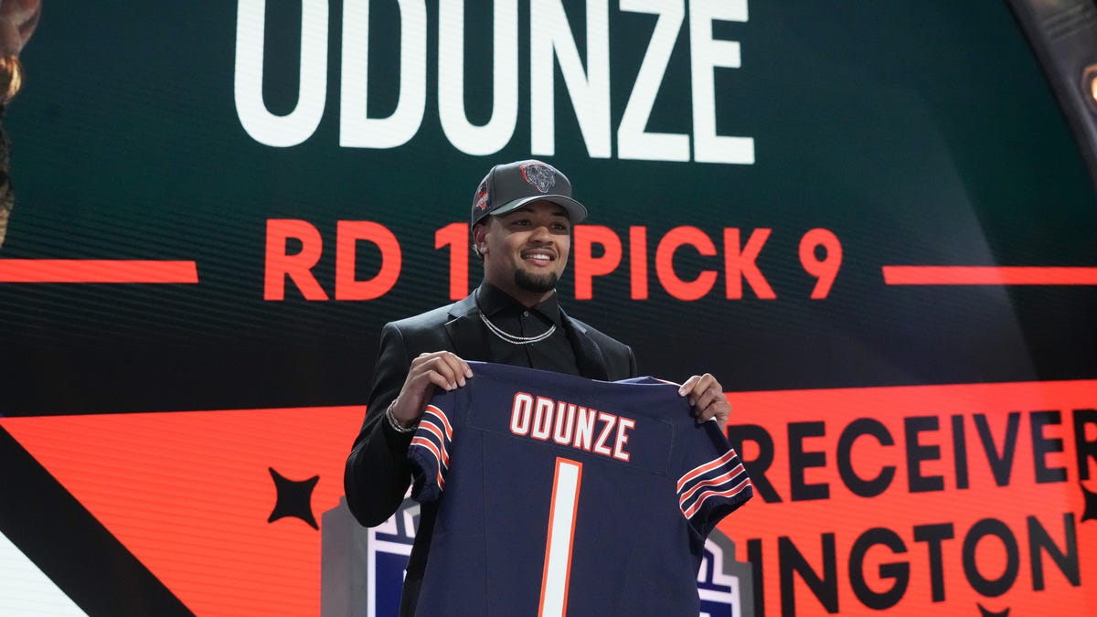 Apr 25, 2024; Detroit, MI, USA; Washington Huskies wide receiver Rome Odunze poses after being selected by the Chicago Bears as the No. 8 pick in the first round of the 2024 NFL Draft at Campus Martius Park and Hart Plaza. Mandatory Credit: Kirby Lee-USA TODAY Sports