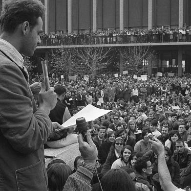 Mario Savio (L), one of the leaders of the Free Speech Movement at the University of California, tells thousands of rally attendees that his group will continue efforts to expand political freedom on the campus on Dec. 4, 2964 in Berkeley, Calif.