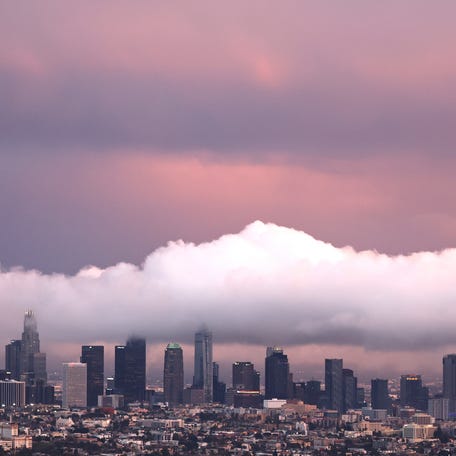 The downtown skyline is viewed during a clearing storm on January 22, 2024 in Los Angeles, California.