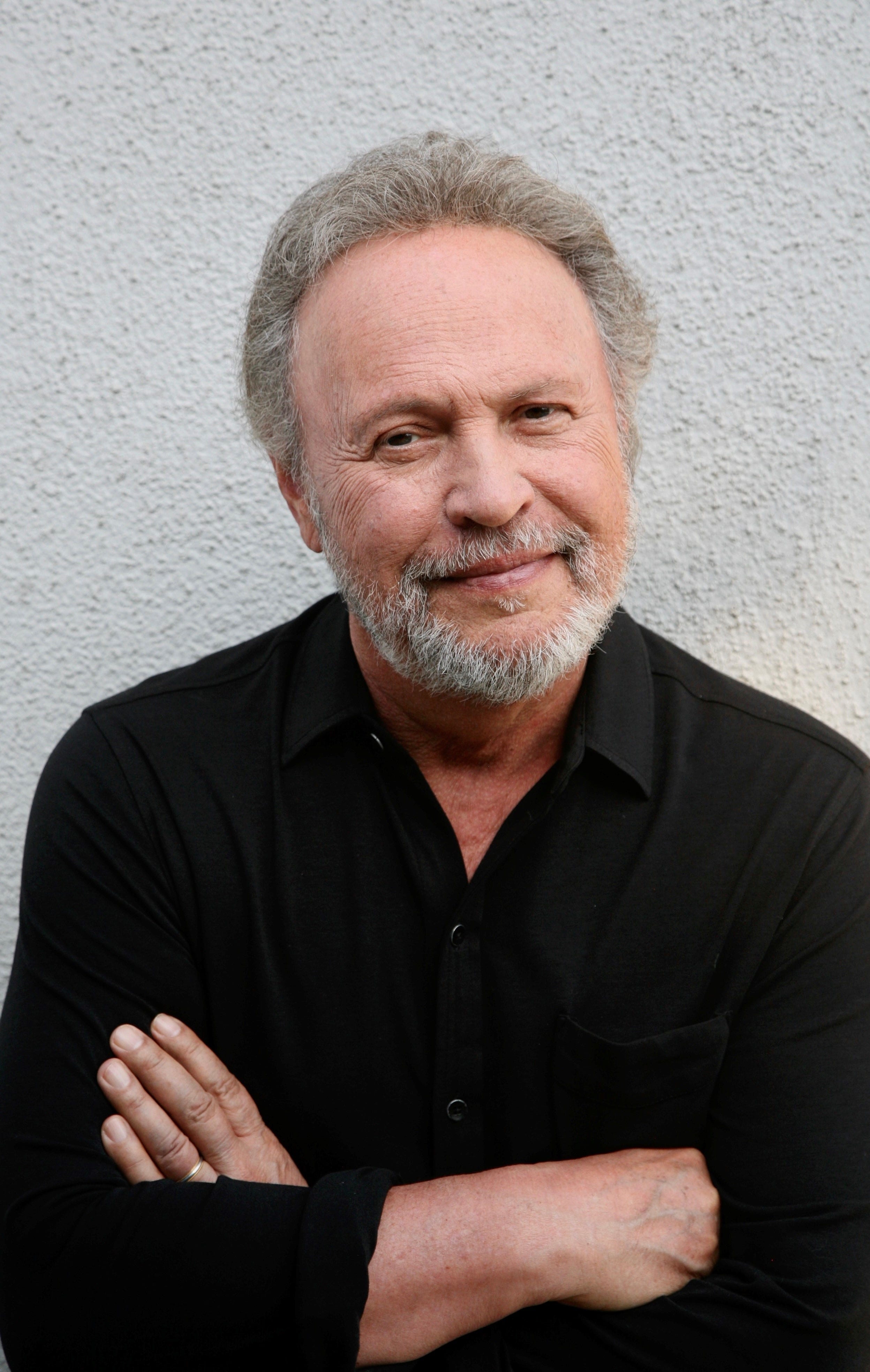 Billy Crystal is back as green goofball Mike Wazowski in the second season of "Monsters at Work," streaming May 5 on Disney+.