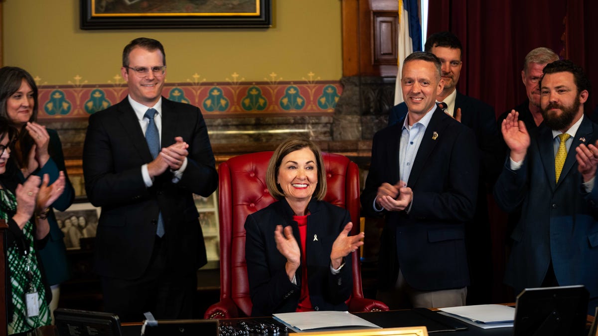 Gov. Kim Reynolds signs a new Iowa income tax cut into law. What that means for you: