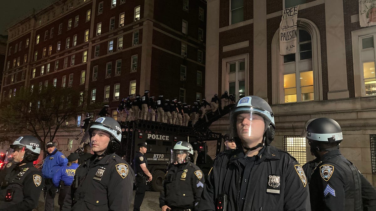 The professor had just finished his last class to end a 28-year teaching career at Columbia University. Then police arrested him outside his home.