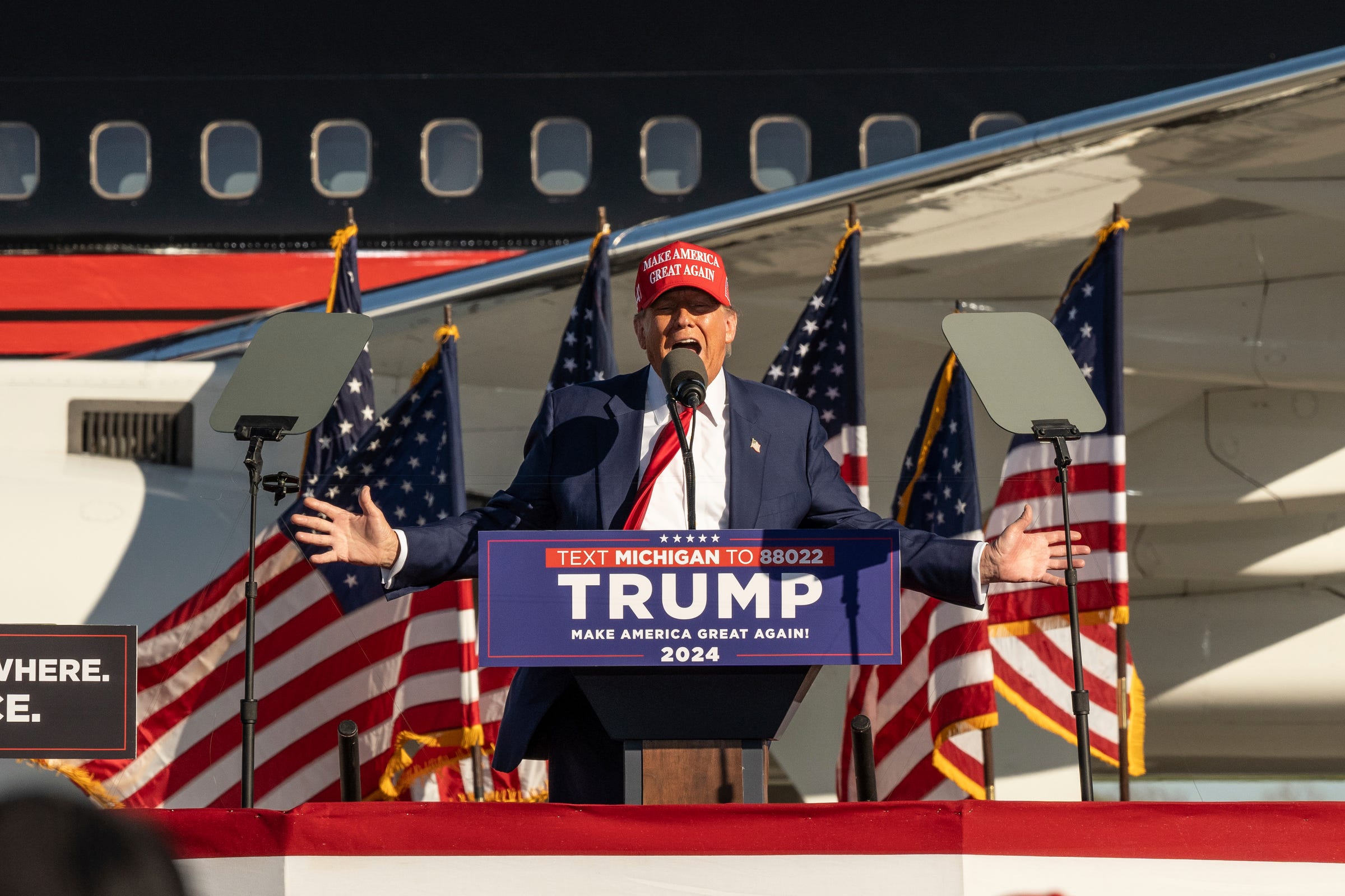 Former President Donald Trump speaks to a crowd of supporters during a rally at Avflight Saginaw in Freeland on Wednesday, May 1, 2024.