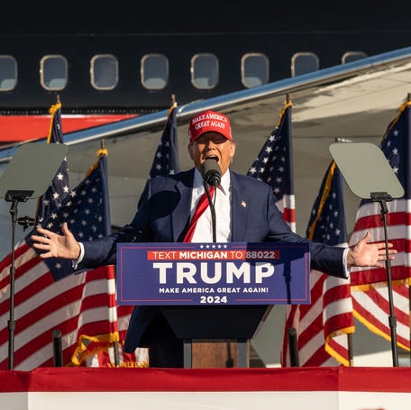 Former President Donald Trump speaks to a crowd of supporters during a rally at Avflight Saginaw in Freeland on Wednesday, May 1, 2024.