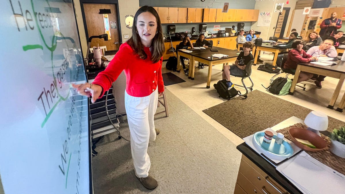 Hailey Beville Whitehead, teacher of the year at Robert Anderson Middle School in Anderson, South Carolina, leads a discussion on pronouns with her class on April 24, 2024.