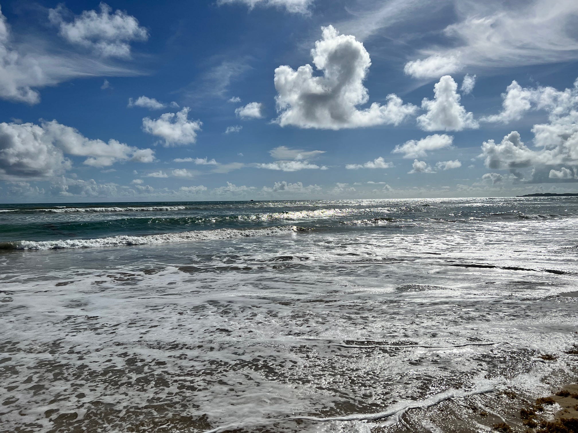 Waves roll onto the shore in Punta Cana, one of summer 2024's most popular international destinations, according to Allianz.