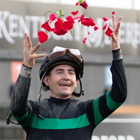 Jockey Brian Hernandez Jr. celebrates after riding Mystik Dan to victory during the 150th Kentucky Derby at Churchill Downs.
