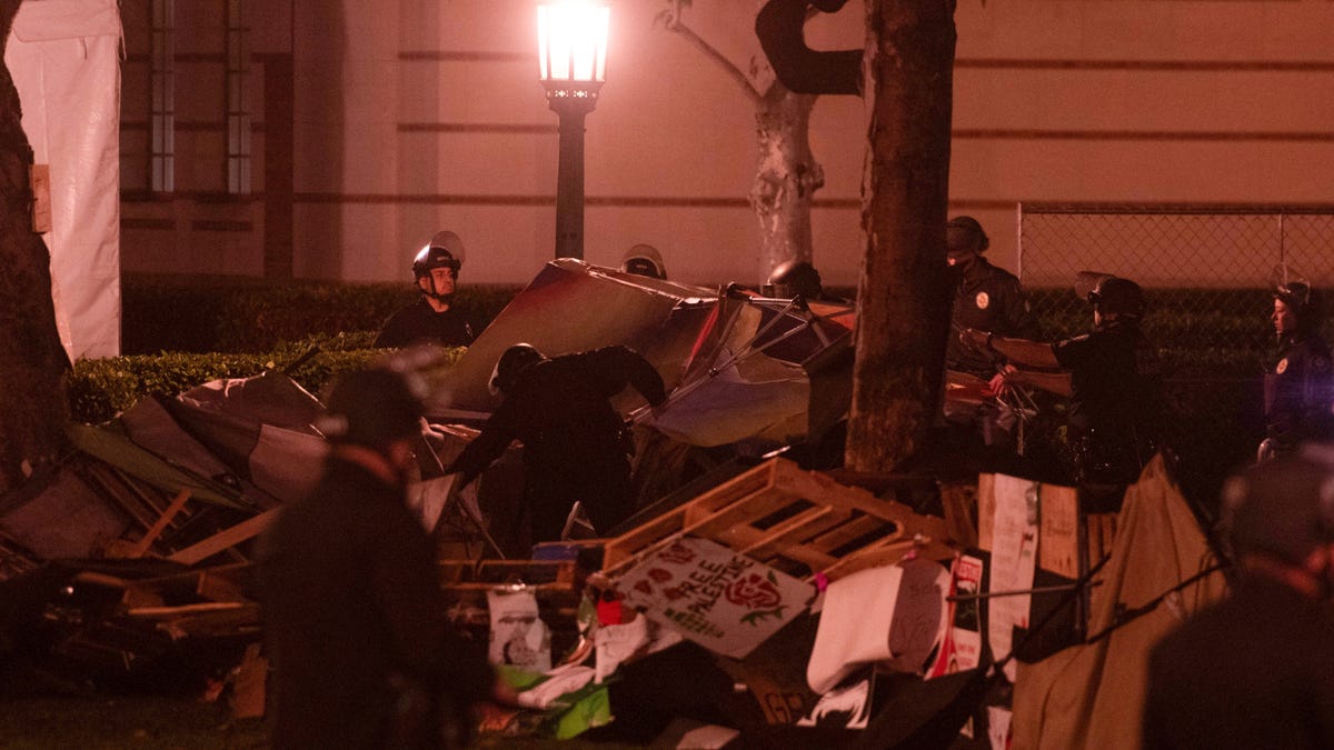 Los Angeles Police Department officers dismantle the pro-Palestinian encampment on Alumni Park at the University of Southern California (USC) in Los Angeles, California, on May 5, 2024.