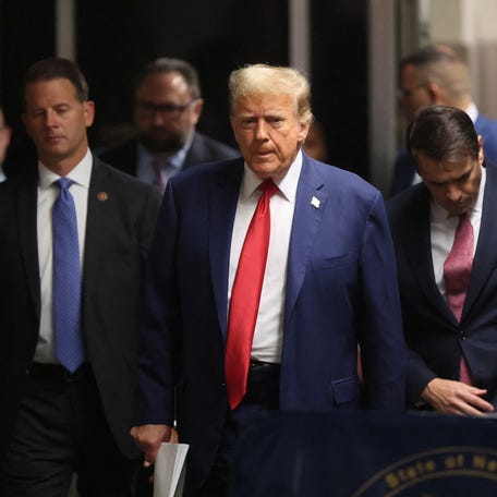 Republican presidential candidate and former U.S. President Donald Trump walks, as his criminal trial over charges that he falsified business records to conceal money paid to silence porn star Stormy Daniels in 2016 continues, at Manhattan state court in New York City, U.S., May 6, 2024.