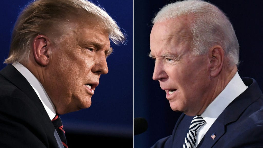 TOPSHOT - (COMBO) This combination of pictures created on September 29, 2020 shows US President Donald Trump (L) and Democratic Presidential candidate former Vice President Joe Biden squaring off during the first presidential debate at the Case Western Reserve University and Cleveland Clinic in Cleveland, Ohio on September 29, 2020. (Photo by JIM WATSON and SAUL LOEB / AFP) (Photo by JIM WATSONSAUL LOEB/AFP via Getty Images)