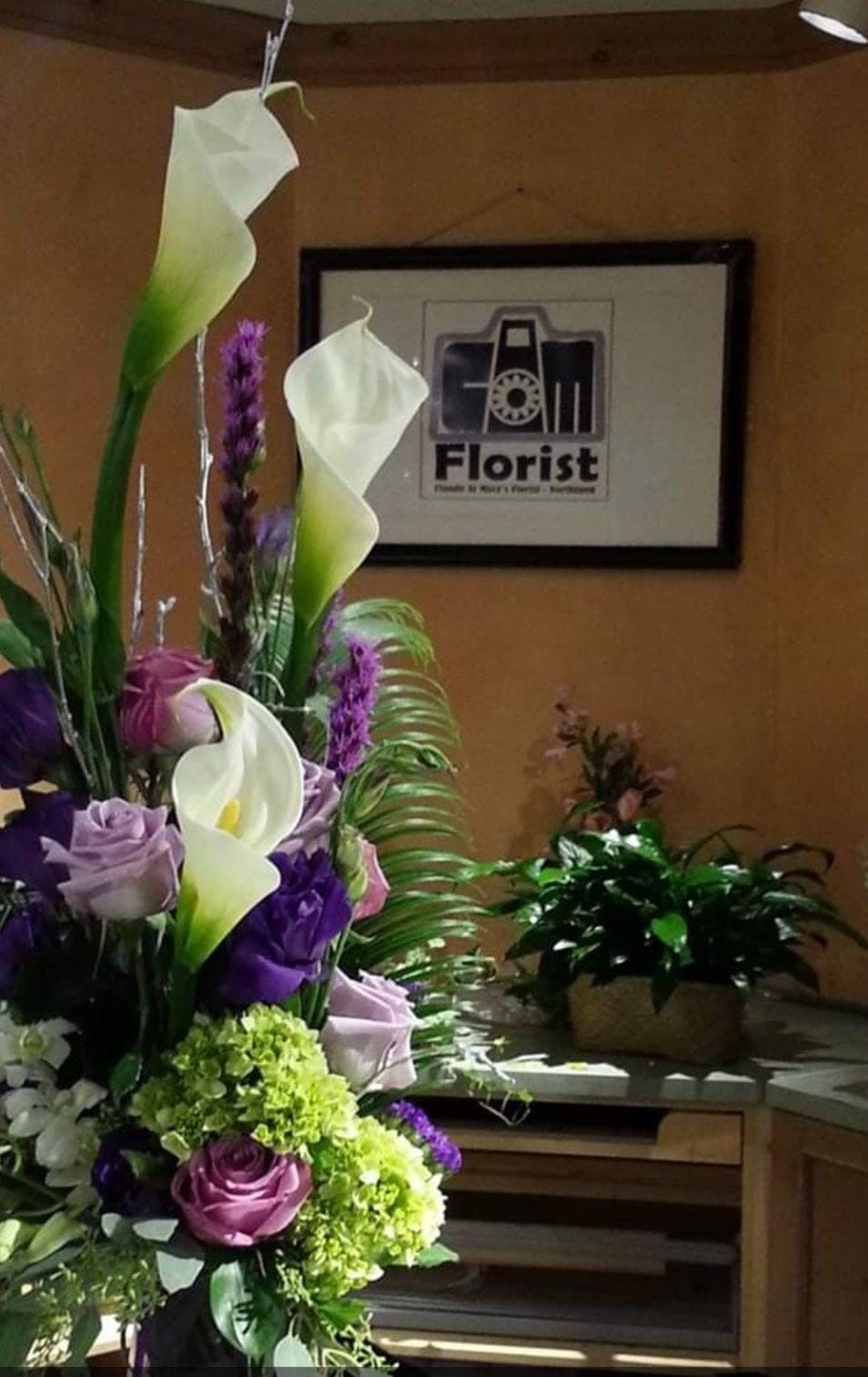 "It's click and mortar," said florist and native Detroiter Claude Thompson, who does business as CAM-Florist, about the method he uses to provide customers with online visual previews of his work.