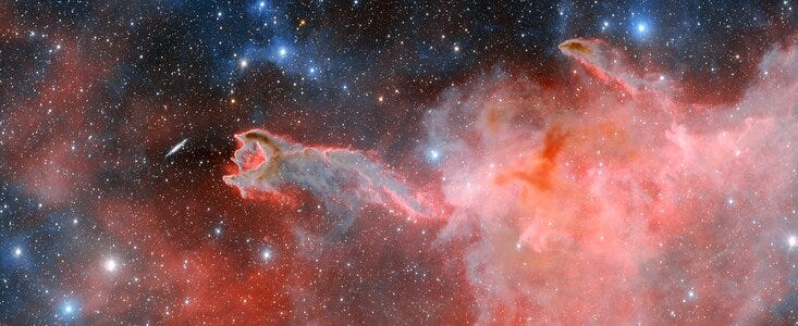 CG 4, a cometary globule nicknamed 'God's Hand," is a cloudy, ominous structure within the Milky Way. Astronomers theorize that cometary globules get their structure from the stellar winds of nearby hot, massive stars.