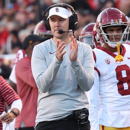 Southern California coach Lincoln Riley reacts after a touchdown against Utah during their 2022 game at Rice-Eccles Stadium.