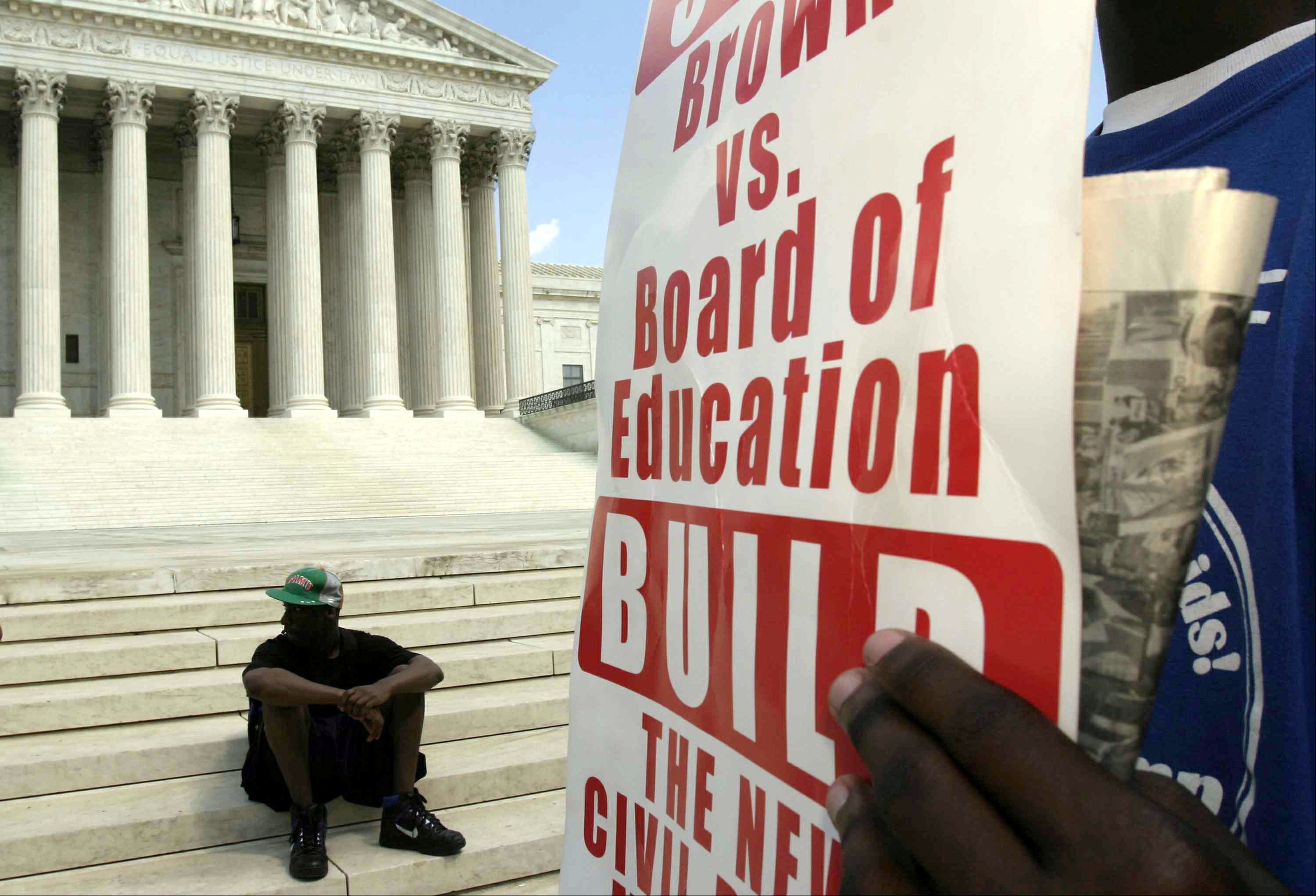 Activists organized by BAMN (By Any Means Necessary) rally in front of the US Supreme Court to mark the anniversary of the Brown vs Board of Education decision May 15, 2004 in Washington, DC.