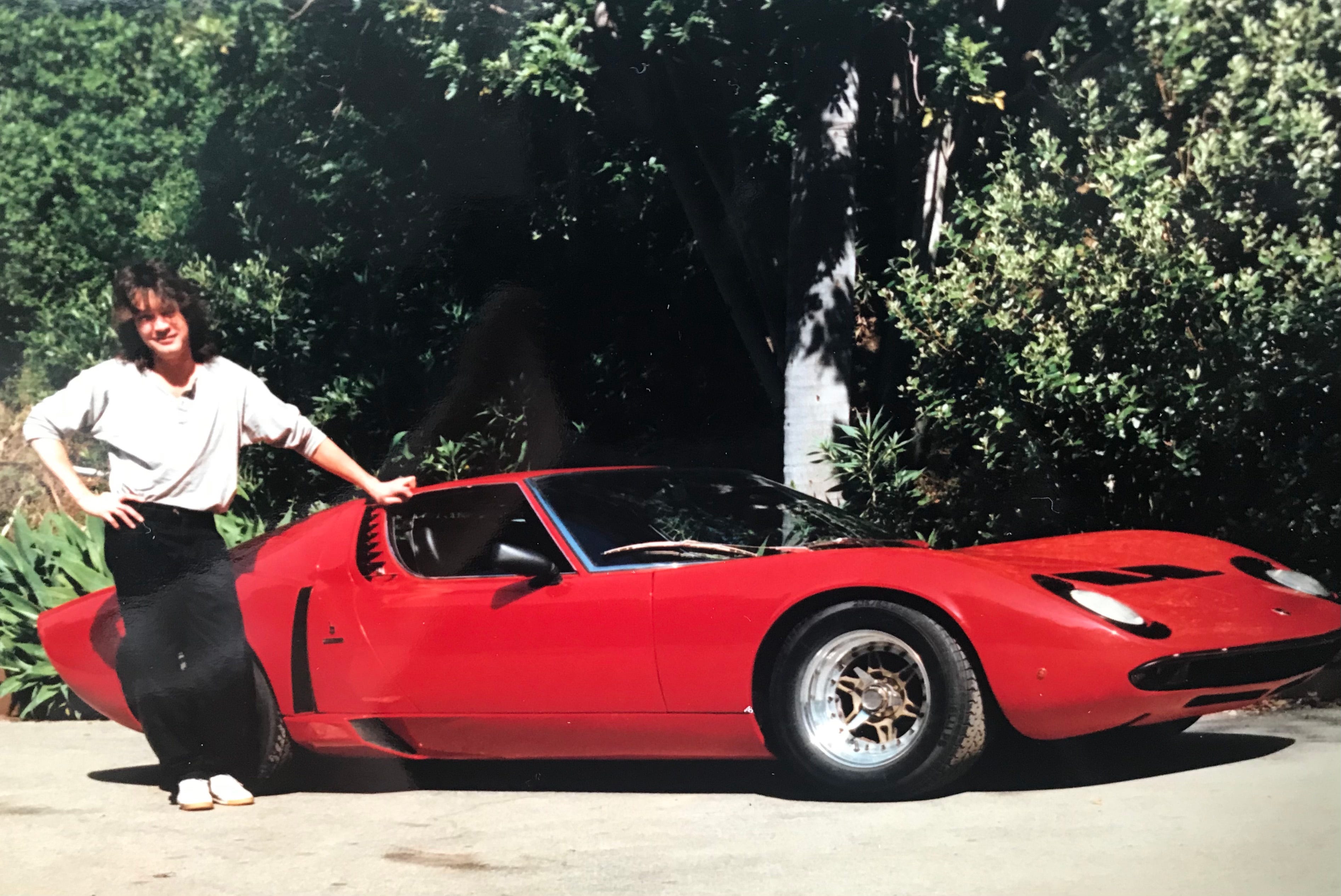 The late-rocker Eddie Van Halen stands with his 1976 Red Lamborghini Mura S in the driveway of the 5150 Studios in Los Angeles, California in this undated photo. The car, given to him as a gift from his then wife Valerie Bertinelli, was used as a sound effect in the 1984 hit song "Panama."