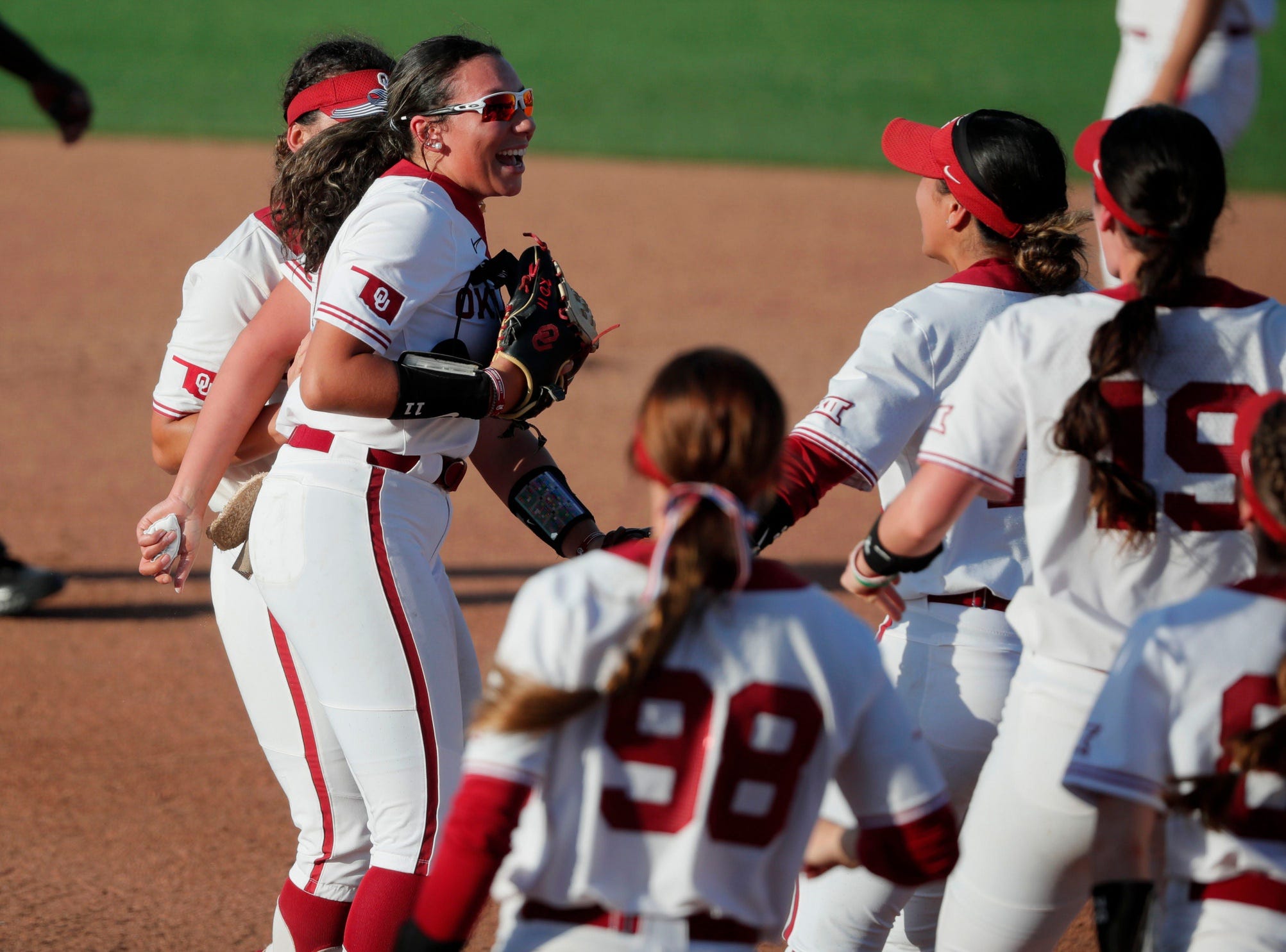 Oklahoma's Kierston Deal (11) celebrates after a Bedlam college softball game between the Oklahoma State University Cowgirls (OSU) and the University of Oklahoma Sooners (OU) in Stillwater, Okla., Saturday, May 6, 2023. Oklahoma won 4-2.