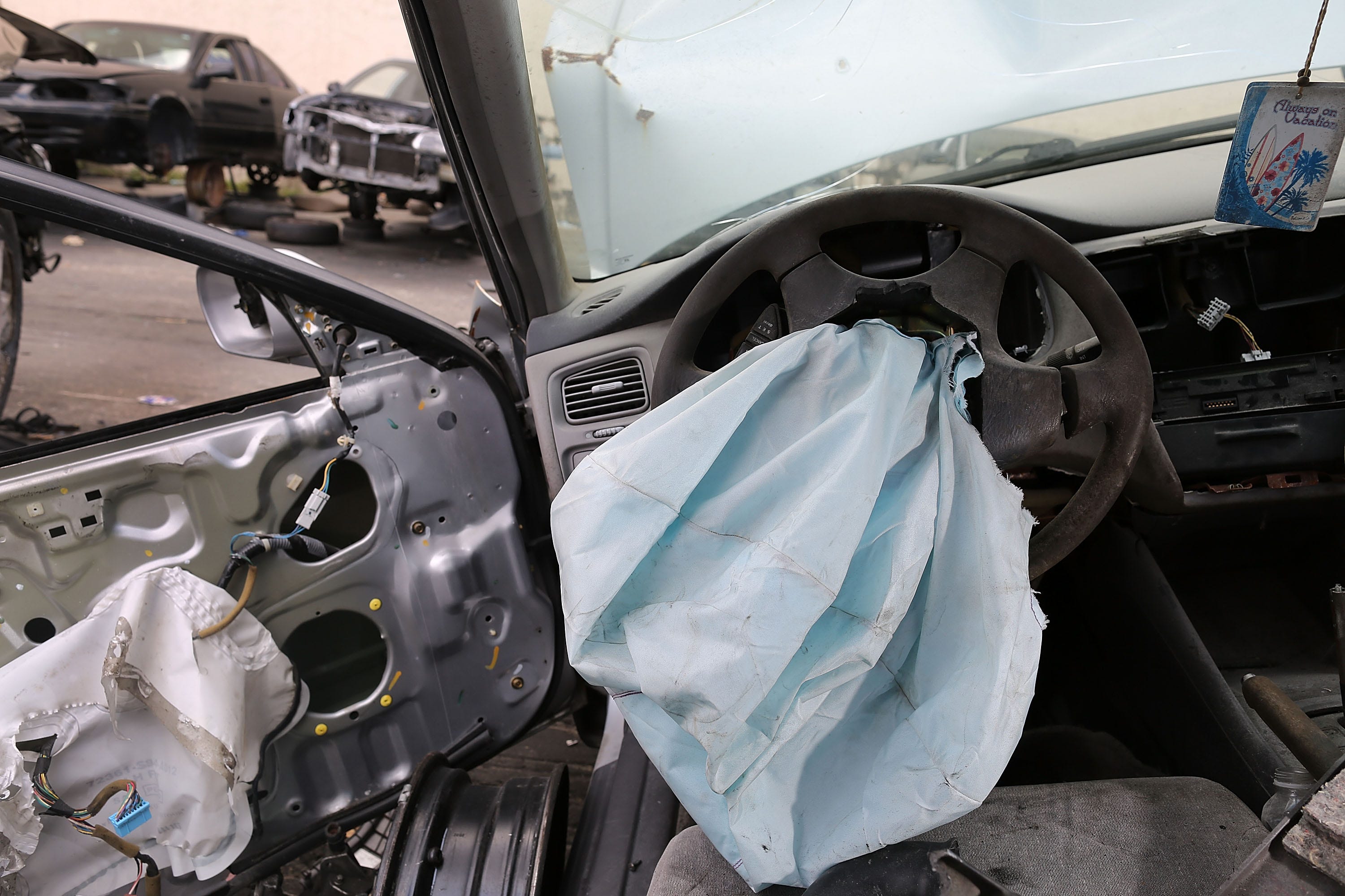 A deployed airbag is seen in a 2001 Honda Accord at the LKQ Pick Your Part salvage yard on May 22, 2015 in Medley, Florida. The largest automotive recall in history centers around the defective Takata Corp. air bags that are found in millions of vehicles that are manufactured by BMW, Chrysler, Daimler Trucks, Ford, General Motors, Honda, Mazda, Mitsubishi, Nissan, Subaru and Toyota.
