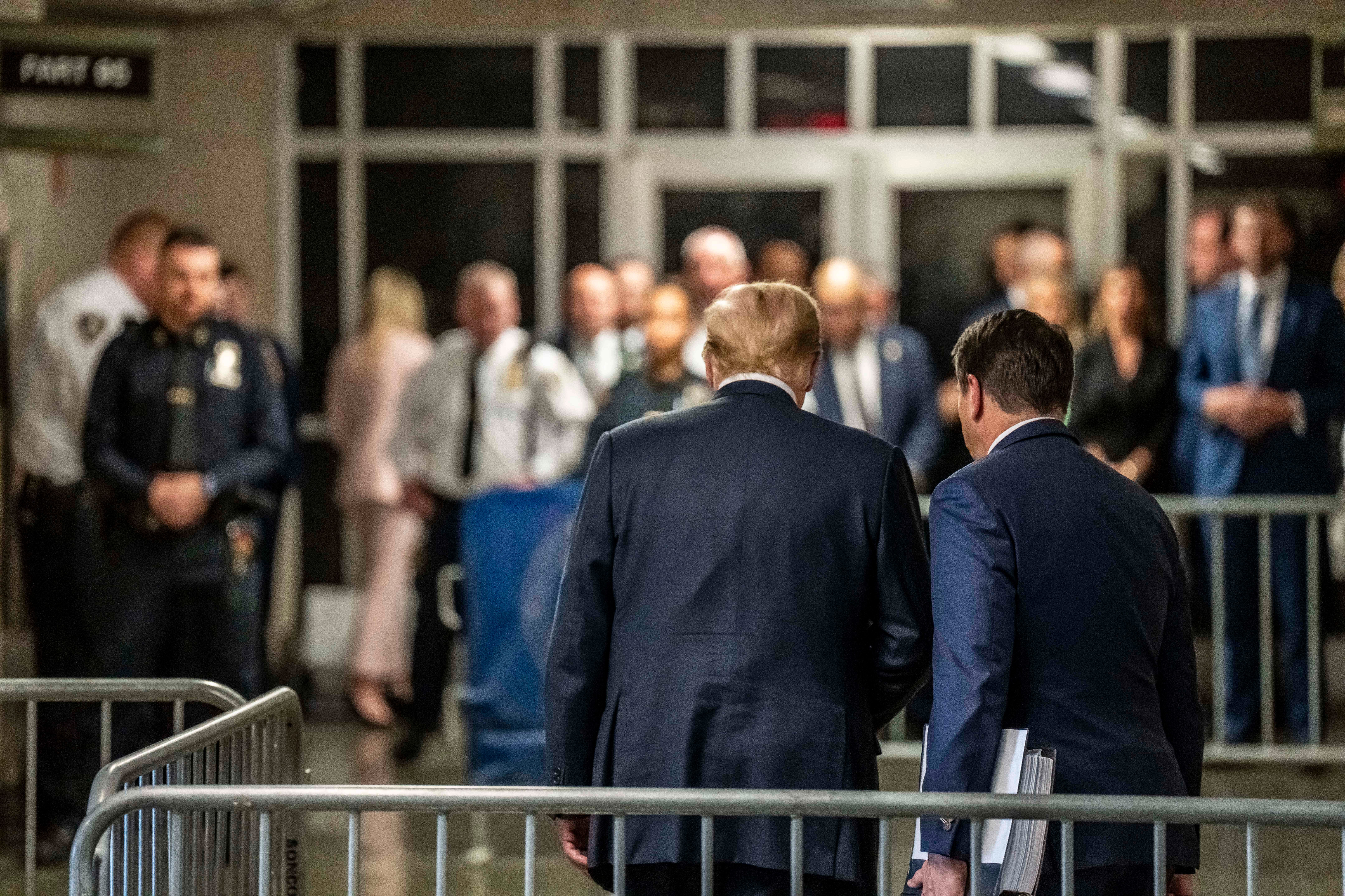 Former President Donald Trump exits after a guilty verdict at his criminal trial in New York City on May 30, 2024.