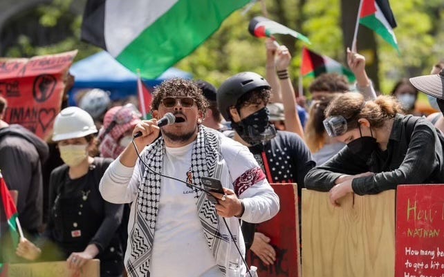 Youssef Hasweh, a University of Chicago political science student who expected to graduate Saturday, speaks at a student protest against Israel's military attacks in Gaza. Hasweh, 22, is one of four seniors whose degrees are being withheld by administrators.