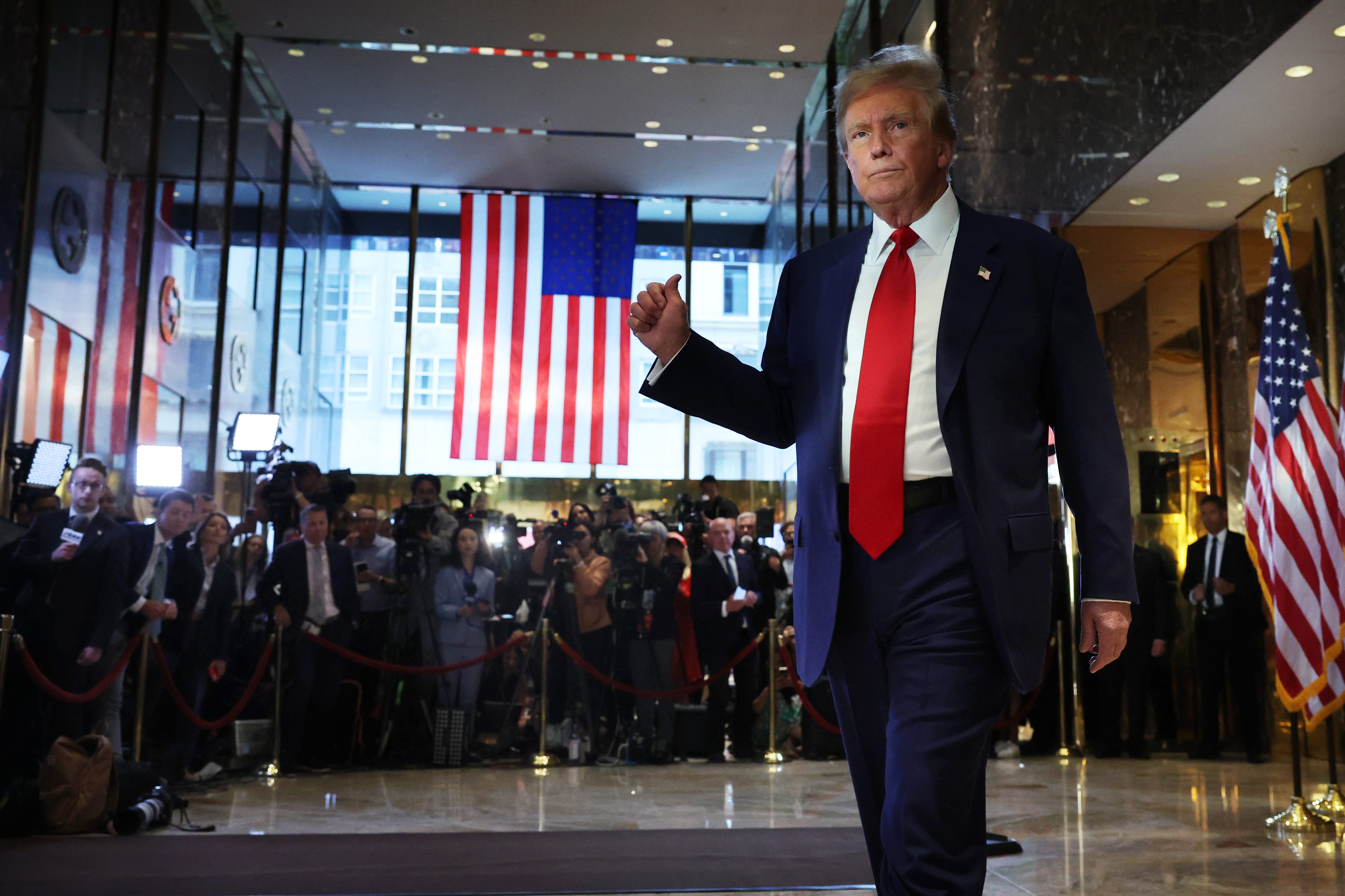NEW YORK, NEW YORK - MAY 31: Former U.S. President Donald Trump leaves after addressing members of the media following the verdict in his hush-money trial at Trump Tower on May 31, 2024 in New York City. A New York jury found Trump guilty Thursday of all 34 charges of covering up a $130,000 hush money payment to adult film star Stormy Daniels to keep her story of their alleged affair from being published during the 2016 presidential election. Trump is the first   former U.S. president to be convicted of crimes. ORG XMIT: 776154185 ORIG FILE ID: 2155447733