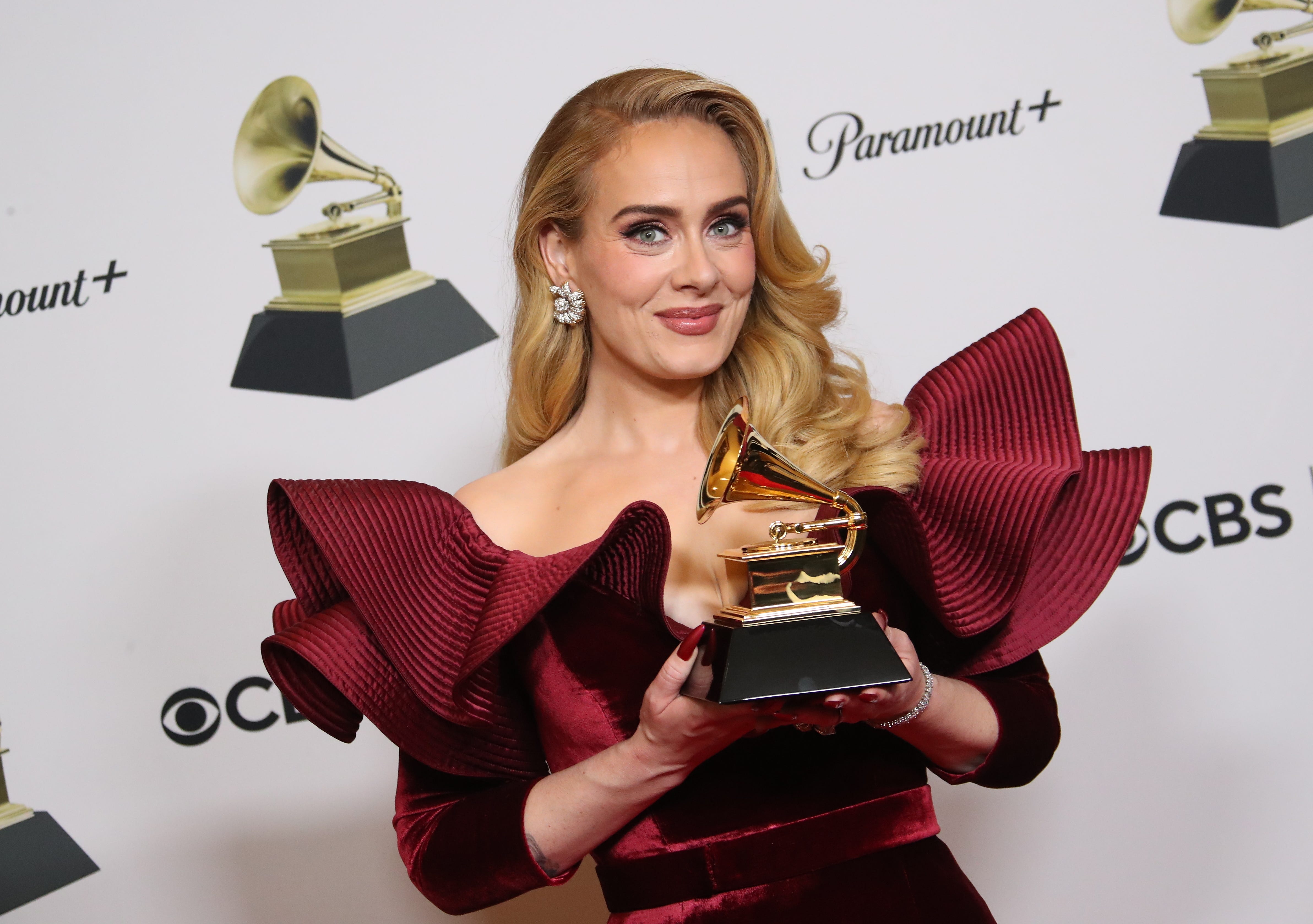 Feb 5, 2023; Los Angeles, CA, USA; Adele, winner of Best Pop Solo Performance for 'Easy On Me', in the press room at the 65th Annual Grammy Awards at Crypto.com Arena in Los Angeles on Sunday, Feb. 5, 2023.. Mandatory Credit: Dan MacMedan-USA TODAY ORG XMIT: USAT-523638 (Via OlyDrop)