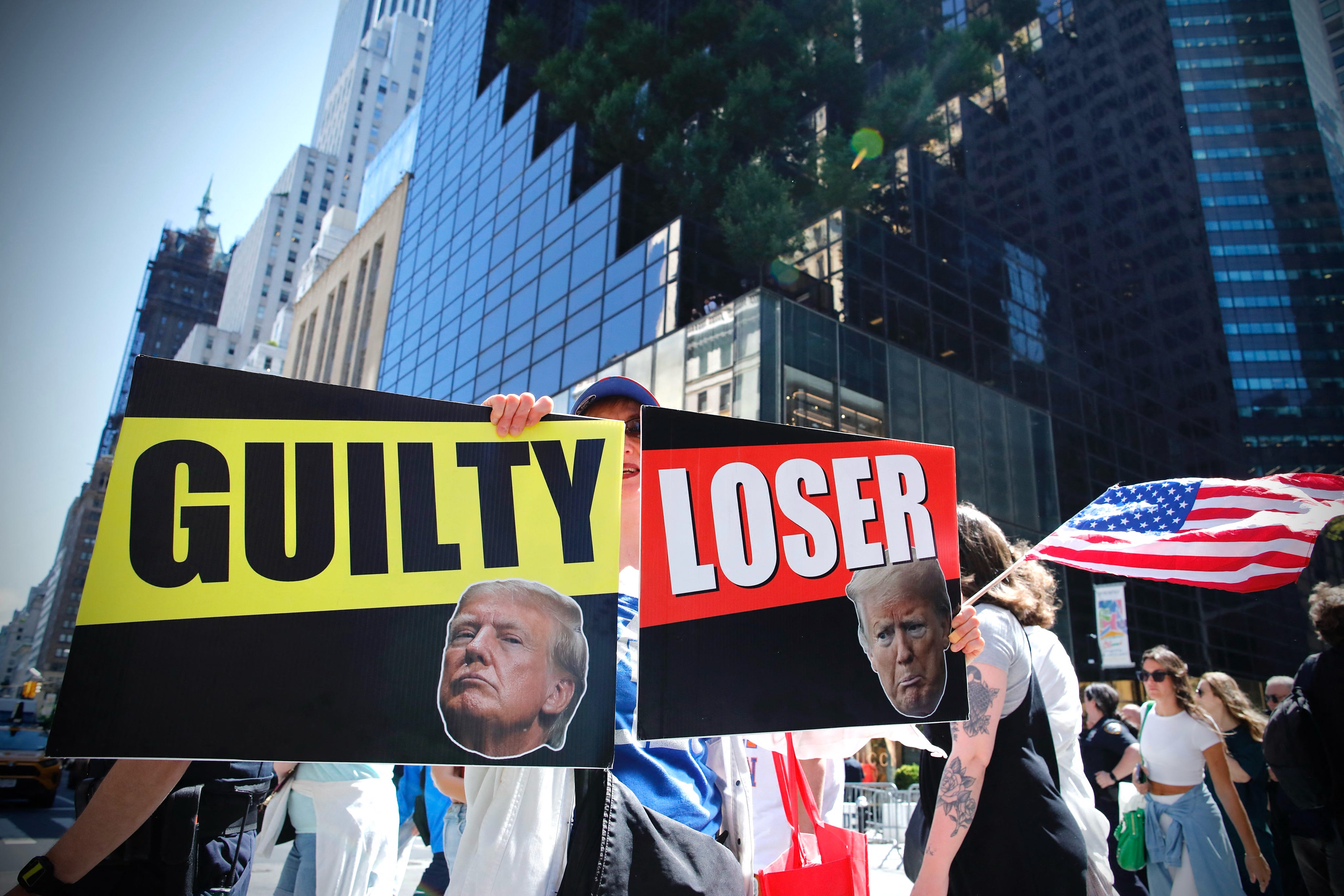Protesters rally outside Trump Tower in New York City on May 31, 2024.