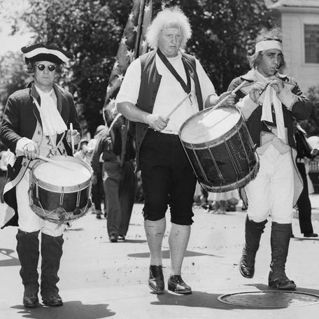1952: The Minute Men march by during Bristol's celebration of the Fourth.