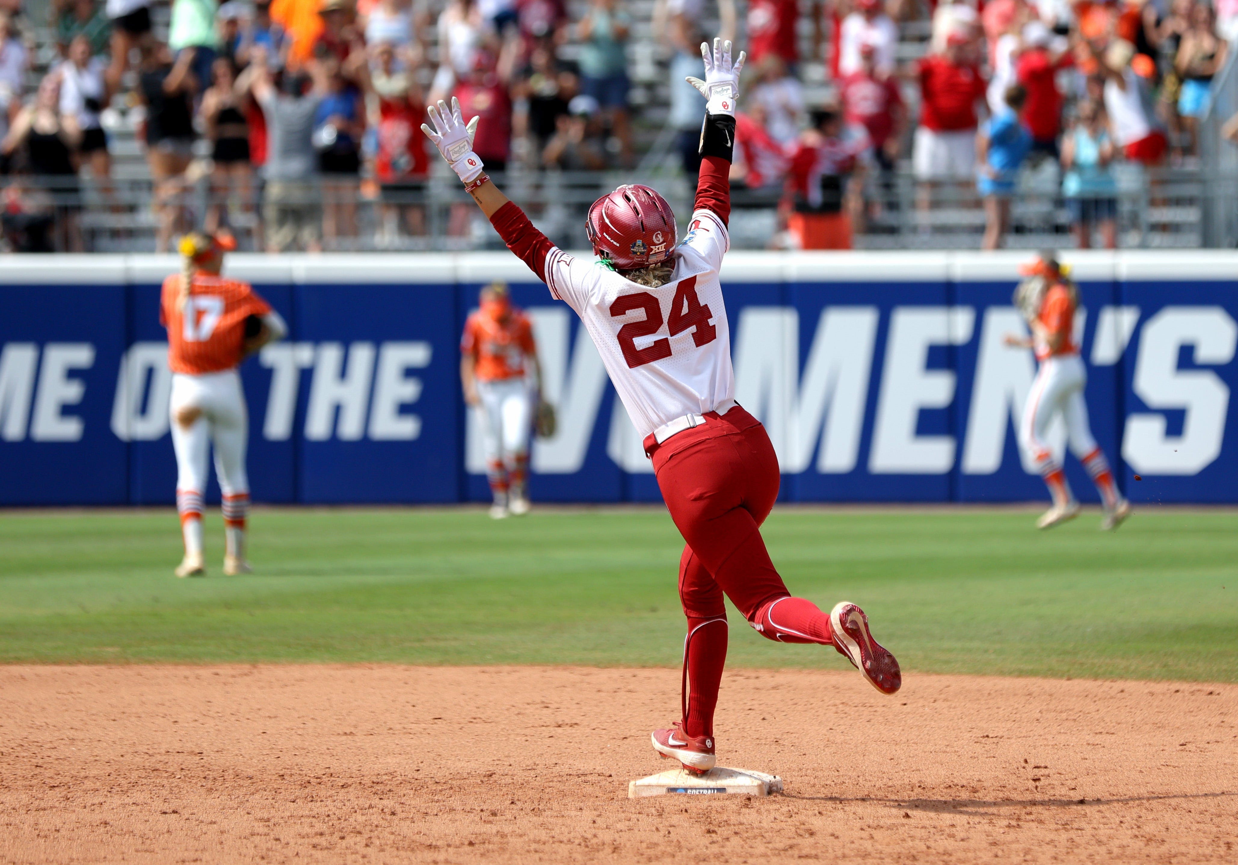 Jayda Coleman celebrates as she rounds the bases after hitting a walk-off home run to send Oklahoma to the WCWS Championship Series.