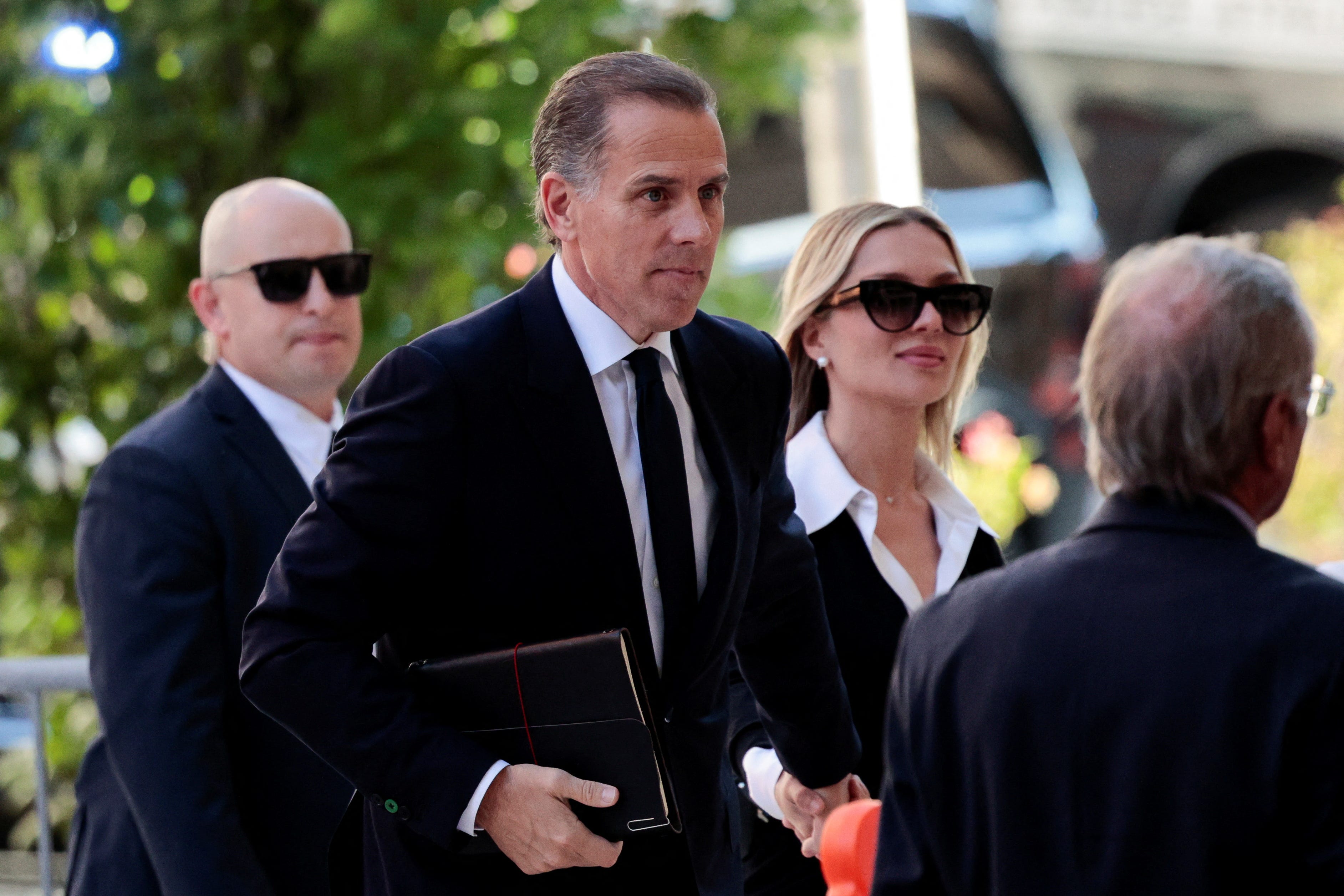 Hunter Biden, son of President Joe Biden, arrives with his wife Melissa Cohen Biden at the federal court for his trial on criminal gun charges, in Wilmington, Delaware, on June 10, 2024.