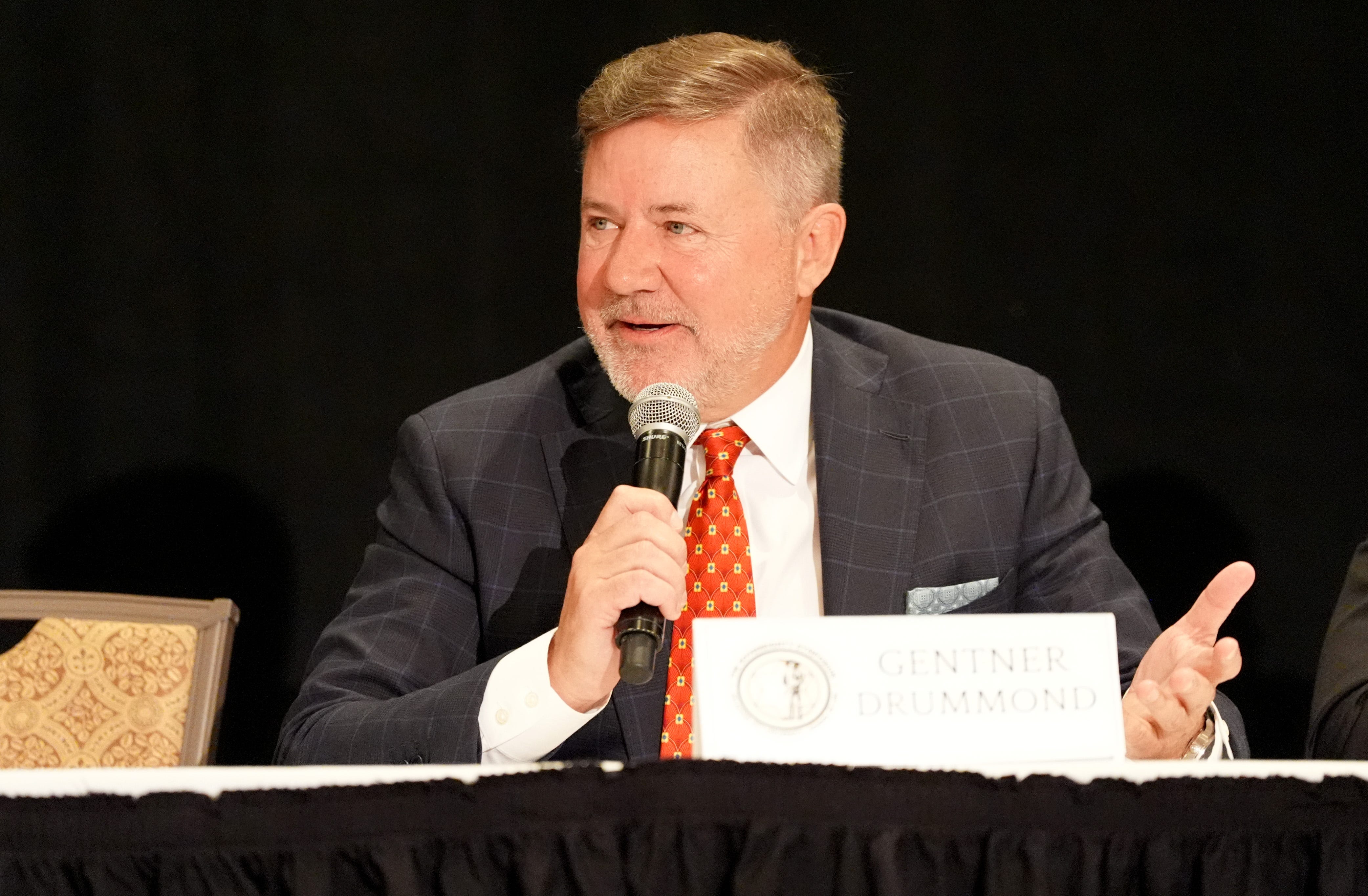 Attorney General Gentner Drummond speaks during the Sovereignty Symposium at the the Skirvin Hilton in Oklahoma City, Tuesday, June, 11, 2024.