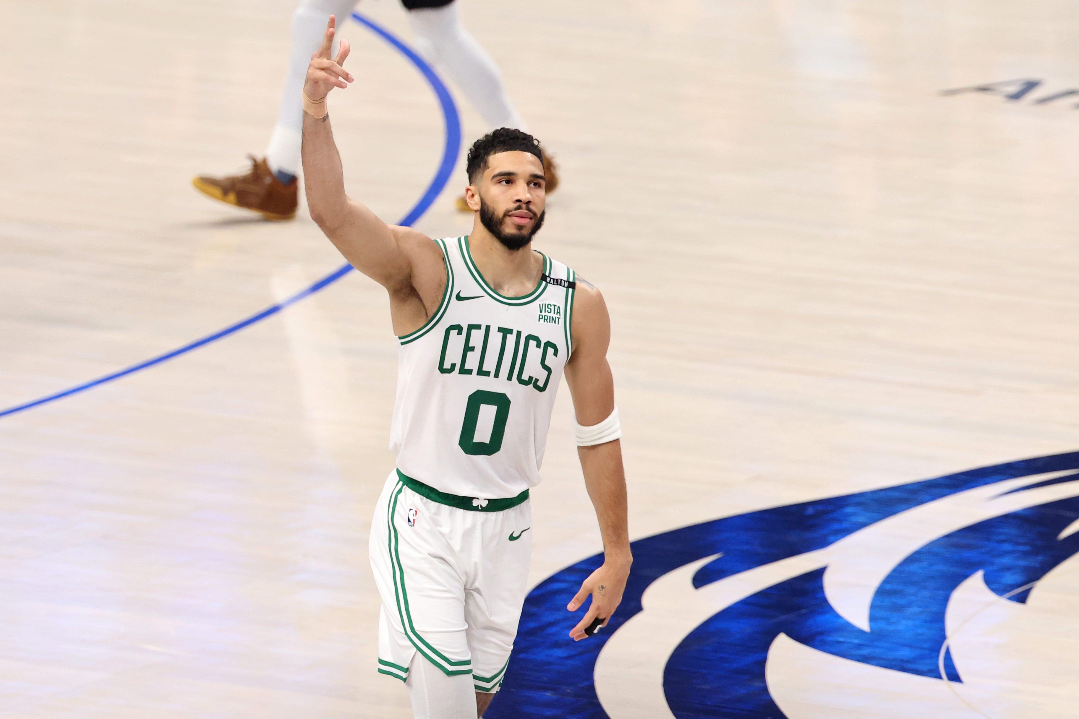 Boston Celtics forward Jayson Tatum celebrates during Game 3.