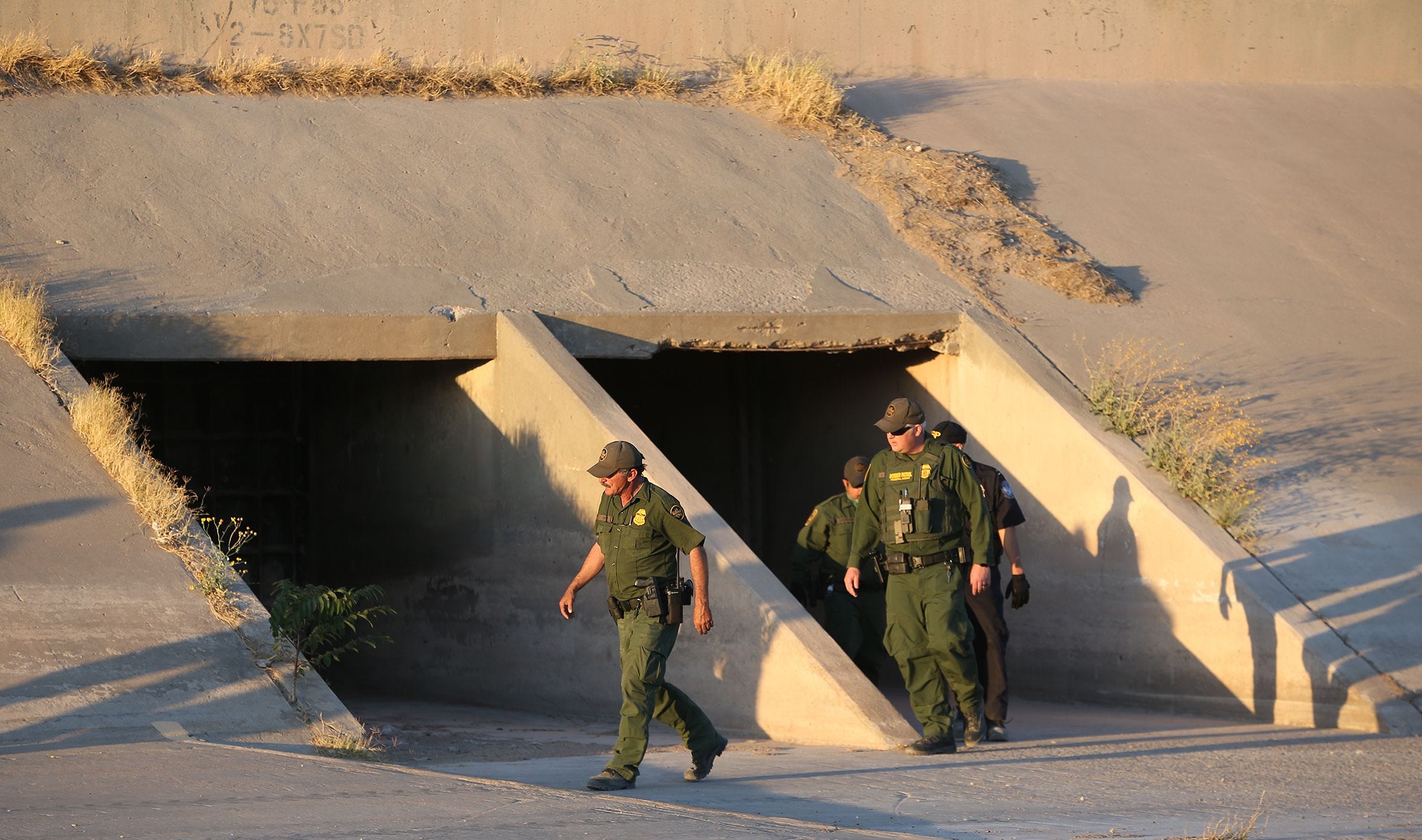 Border Patrol agents check a tunnel in the Rio Grande basin between El Paso and Juarez as they searched for asylum seekers in 2019.